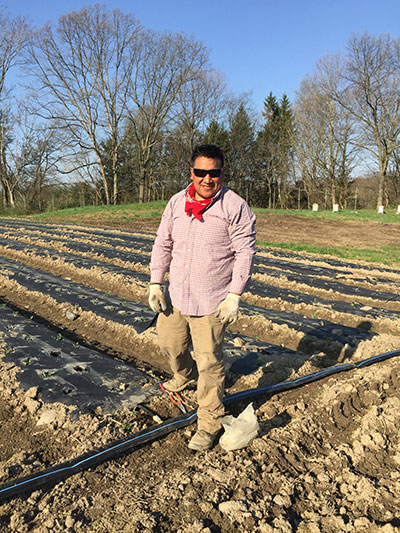 carlos in field with glasses