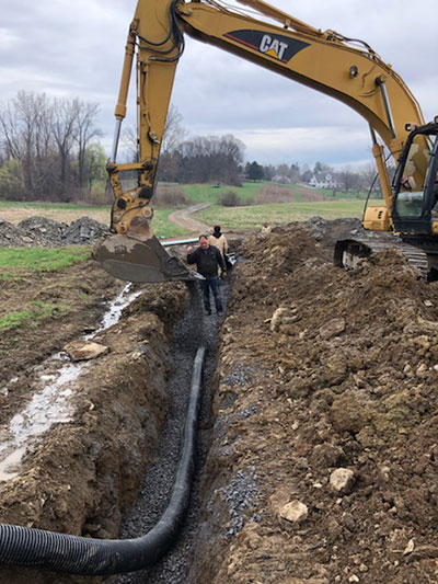 machine making drainage trench