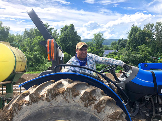 man on tractor