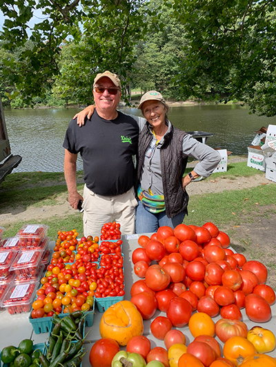 gerry and customer at farm market